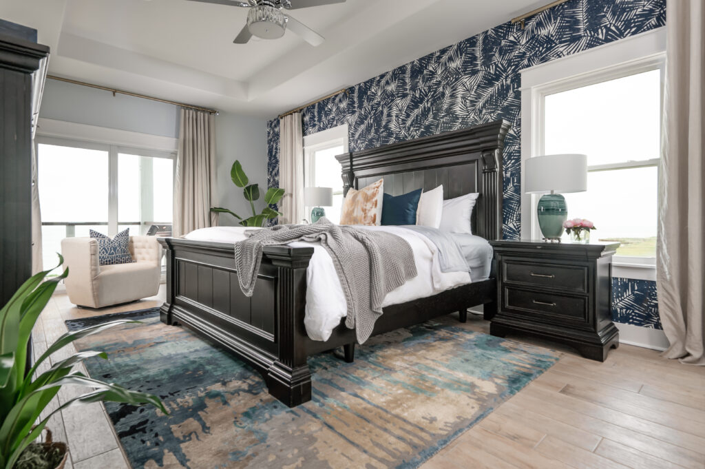 Coastal luxury main bedroom design by Nikki Klugh Design Group.